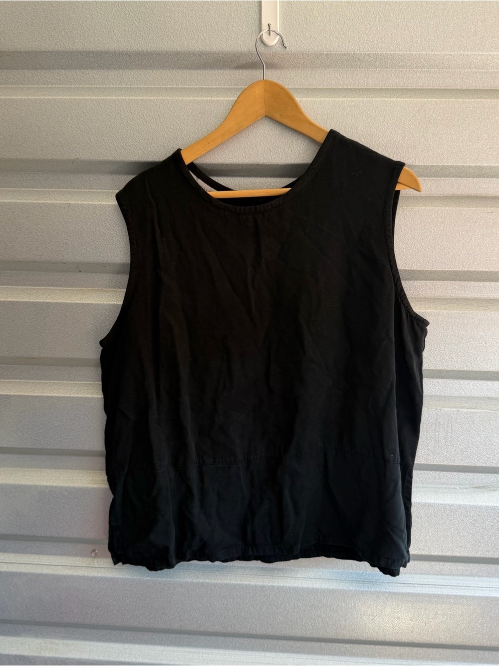 bryn walker black sleeveless blouse